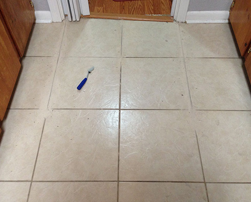 Picture of Grout Scraper on Tile Floor
